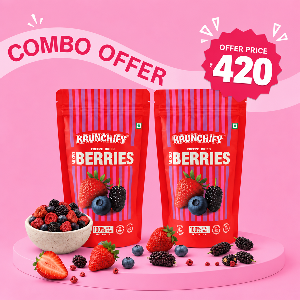 Two red stand-up pouches of Krunchify Freeze Dried Mixed Berries displayed on a pink platform with strawberries, mulberries, blueberries, and a bowl of mixed berries. A pink 'COMBO OFFER' banner and a red 'OFFER PRICE 420' badge appear at the top.